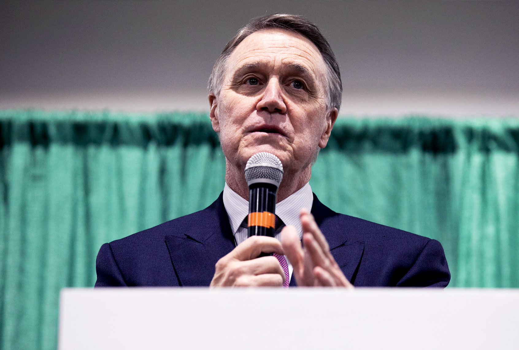 U.S. Sen. David Purdue (R-GA) speaks to the crowd of supporters during a "Defend the Majority" rally at the Georgia National Fairgrounds and Agriculture Center on November 19, 2020 in Perry, Georgia. (Jessica McGowan/Getty Images)