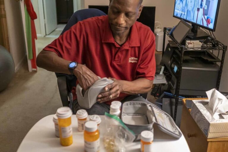 David White, shown at his suburban Washington, D.C. apartment, was on dialysis for almost six years before a successful kidney transplant. (Larry C. Price)