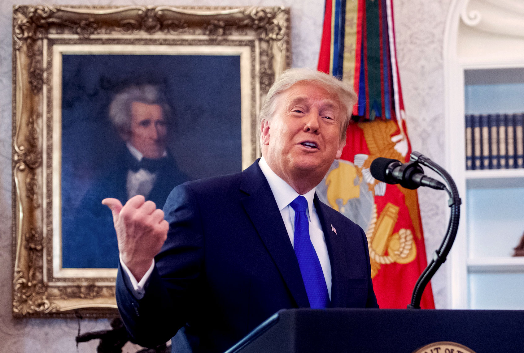 US President Donald Trump speaks during a ceremony presenting the Presidential Medal of Freedom to wrestler Dan Gable in the Oval Office of the White House in Washington, DC on December 7, 2020. (SAUL LOEB/AFP via Getty Images)