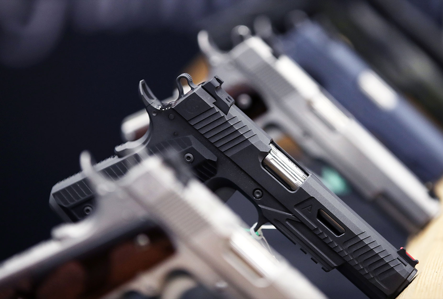 Handguns are displayed during the NRA Annual Meeting & Exhibits at the Kay Bailey Hutchison Convention Center (Justin Sullivan/Getty Images)