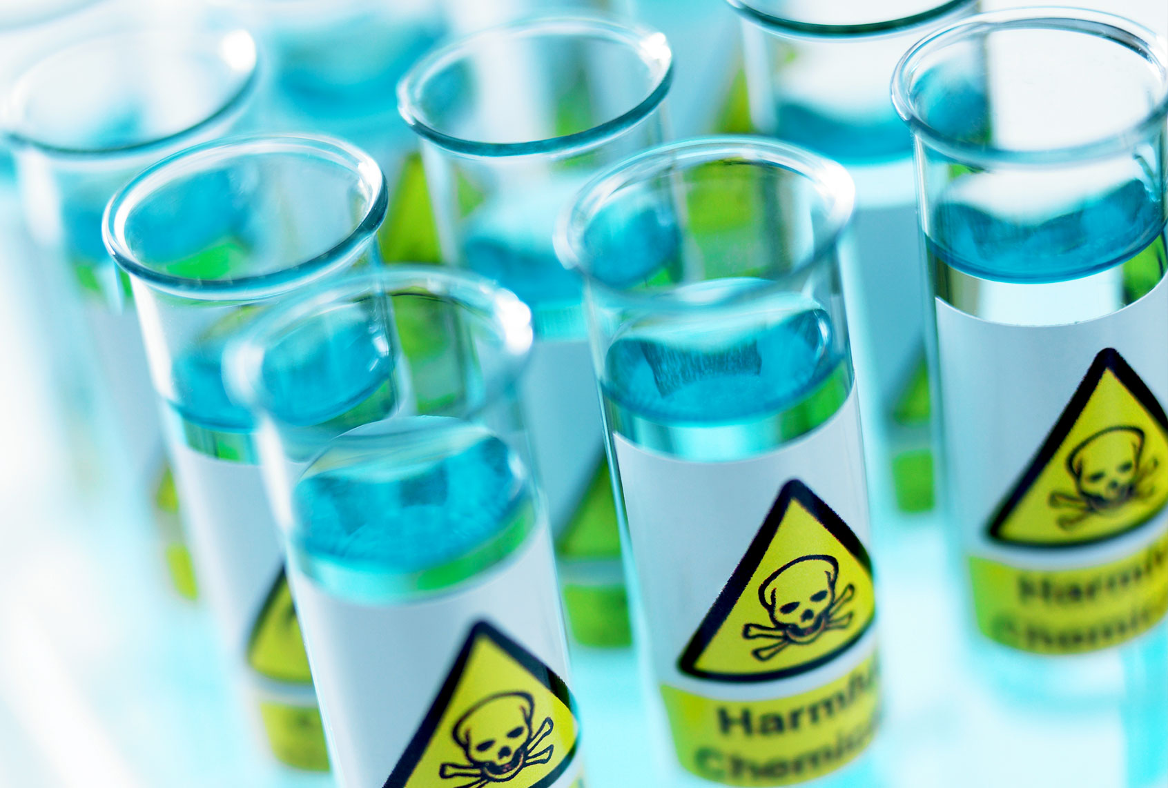 Close up of test tubes with toxic labels (Getty Images)
