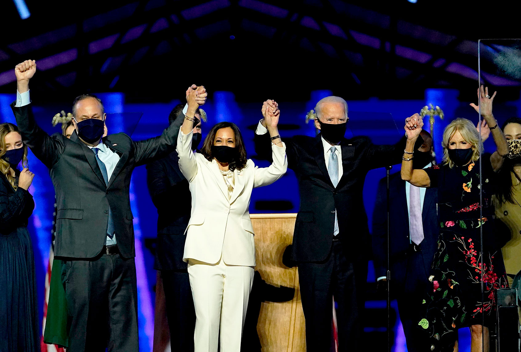 President-elect Joe Biden and Vice President-elect Kamala Harris, stand with their spouses, Dr. Jill Biden and Douglas Emhoff, after addressing the nation from the Chase Center November 07, 2020 in Wilmington, Delaware. (Getty Images)