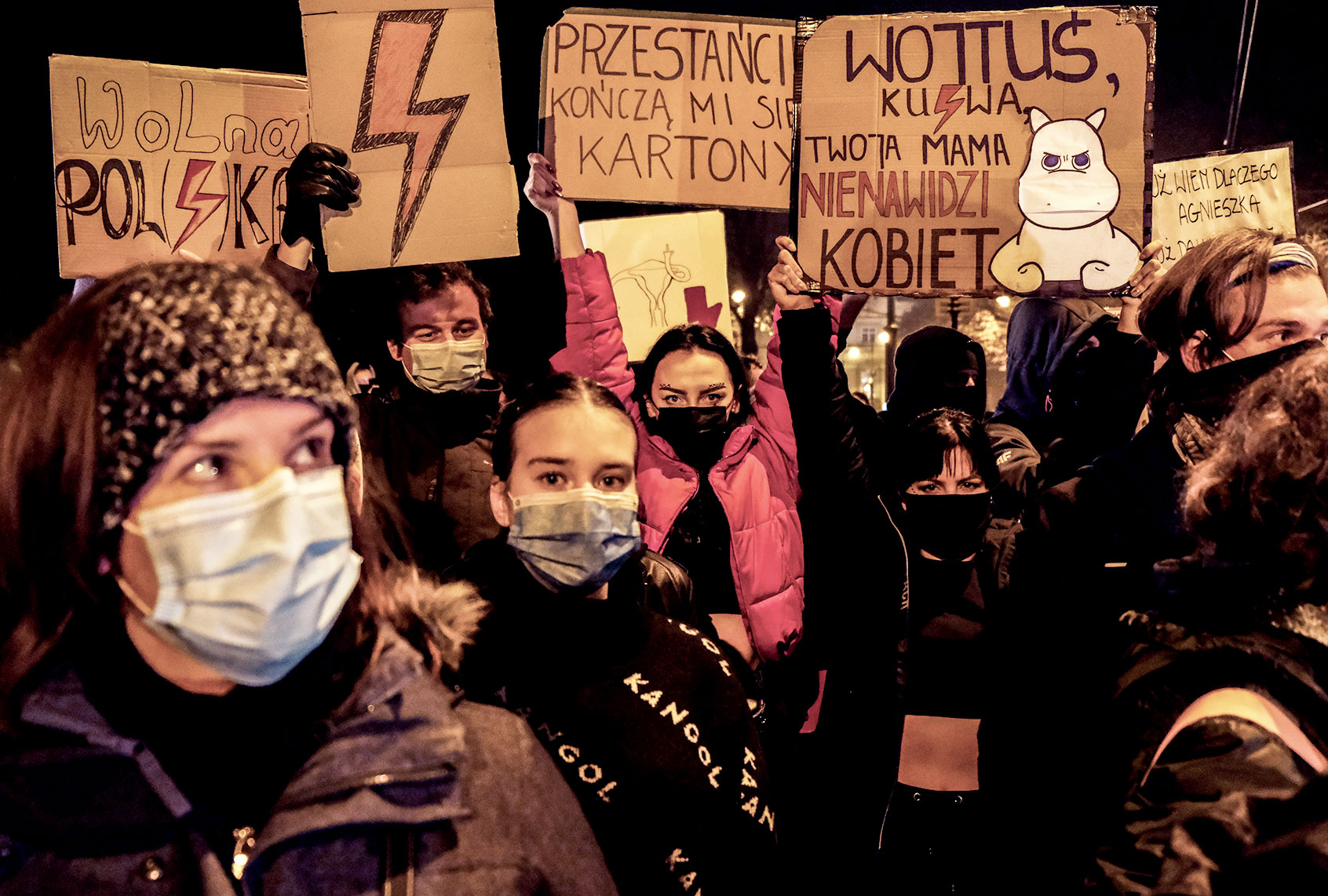 Protesters hold banners and shout slogans during the 12th day of protests against the Constitutional Court ruling on tightening the abortion law in front of the Archbishops Palace on November 02, 2020 in Krakow, Poland. The country's constitutional tribunal recently ruled that terminating pregnancies due to serious, irreversible fetal defects is unconstitutional. The decision sparked a wave of protests against the ruling Law and Justice party (PiS). (Omar Marques/Getty Images)