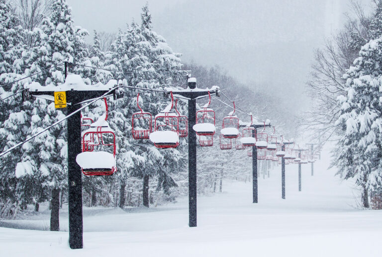 Ski lift filled with fresh powder snow during a snow storm (Getty Images)