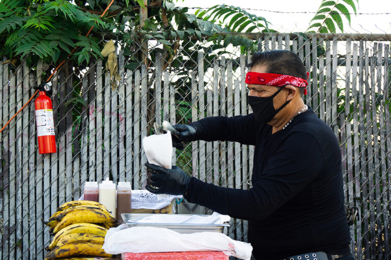 Erika Montiel's father, Felipe, runs the churro station while Erika and her sister Karla make crepes and funnel cakes. (Janette Villafana)