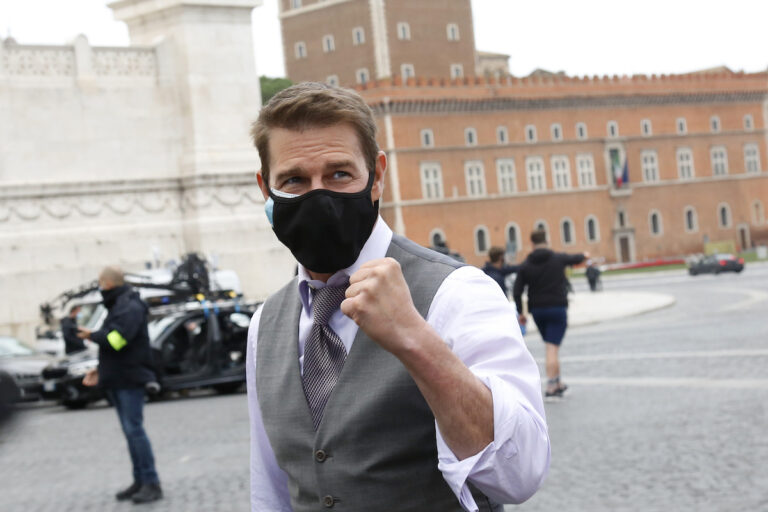 Actor Tom Cruise talking and making selfie with his fans during a pause on the set of the film Mission Impossible 7 in Piazza Venezia, just in front of the Victor Emmanuel II Monument (Tomb of the Unknown Soldier). Rome (Italy), November 29, 2020 (Samantha Zucchi/Insidefoto/Mondadori Portfolio via Getty Images)