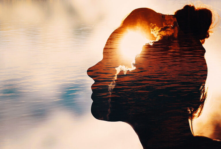 un peeks out from behind the clouds in woman's head. (Getty Images)
