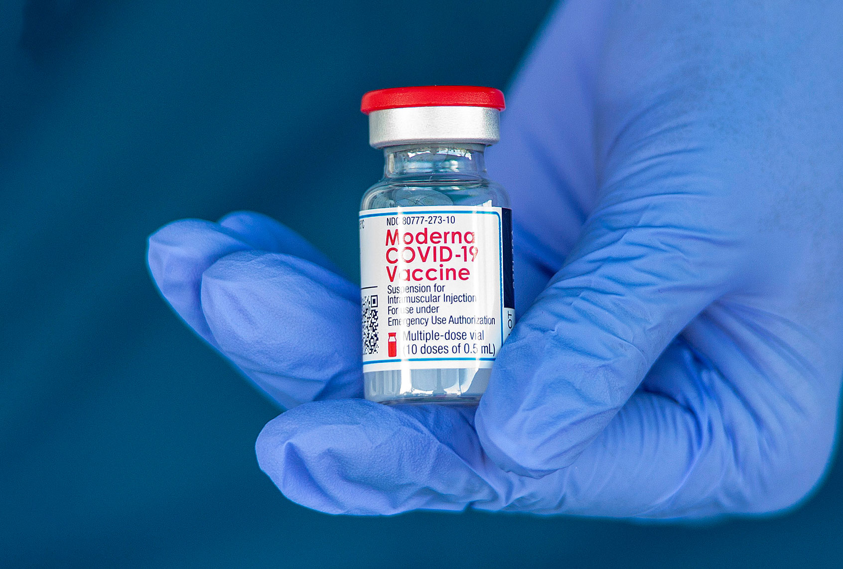 Registered nurse Darlene Dickens-Jeffers holds a vile of the Moderna COVID-19 Vaccine before giving the vaccine to healthcare employees of AltaMed Medical and Dental Group in Anaheim on Friday, January 8, 2021. (Mark Rightmire/MediaNews Group/Orange County Register via Getty Images)