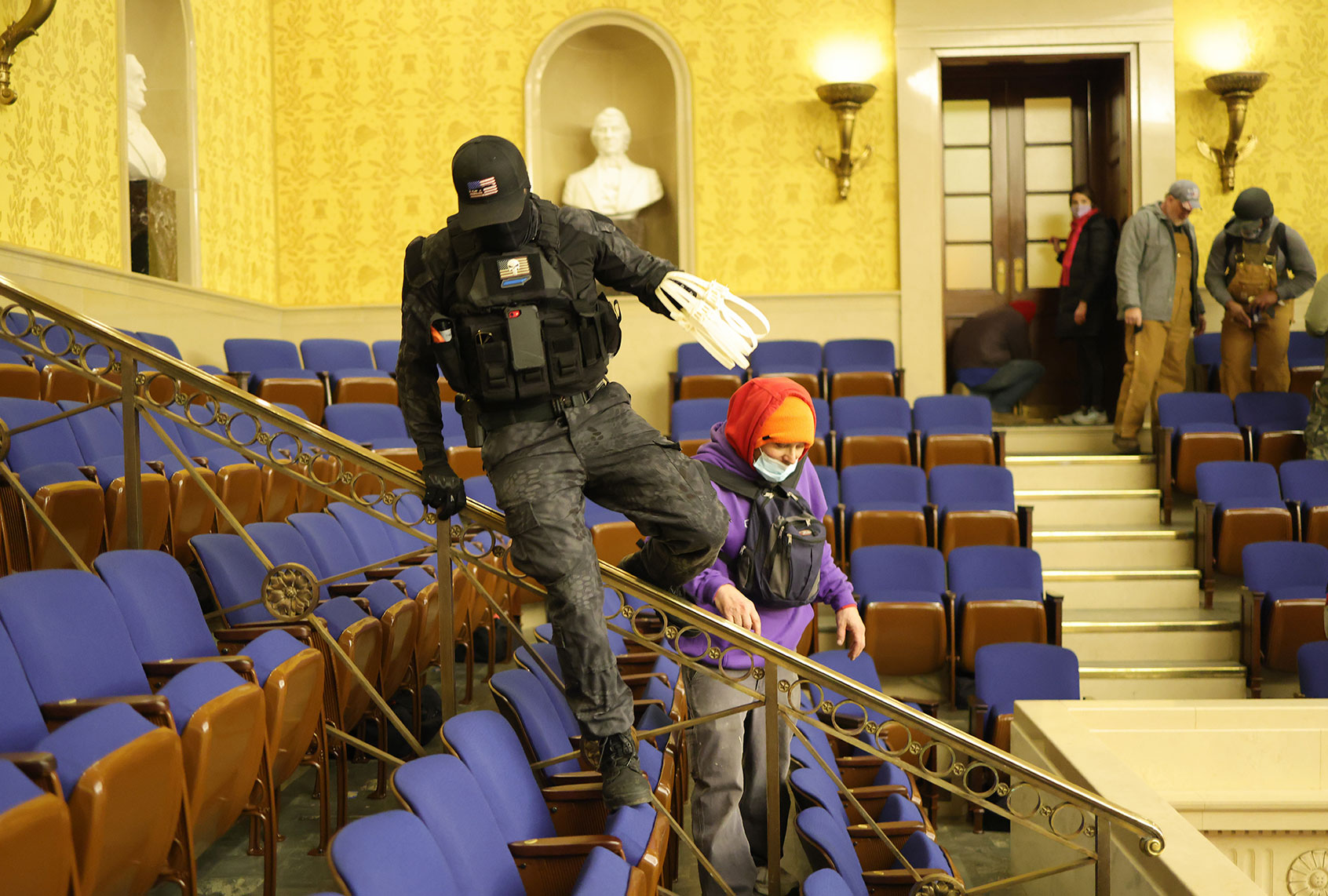 Protesters enter the Senate Chamber on January 06, 2021 in Washington, DC. Congress held a joint session today to ratify President-elect Joe Biden's 306-232 Electoral College win over President Donald Trump. Pro-Trump protesters have entered the U.S. Capitol building after mass demonstrations in the nation's capital. (Win McNamee/Getty Images)