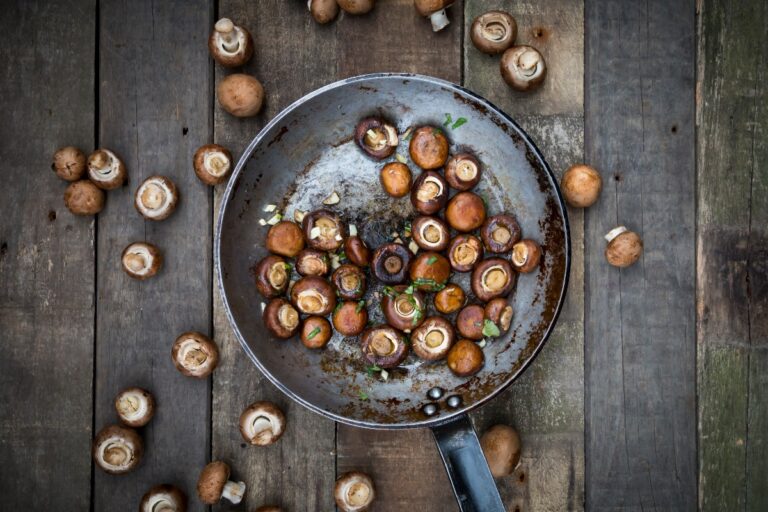Crimini mushrooms with garlic and basil in pan, braised (Getty Images)