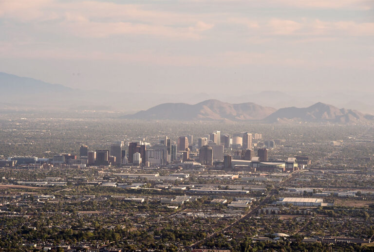 View of the downtown Phoenix, Arizona city skyline as seen from South Mountain Park (ROBYN BECK/AFP via Getty Images)