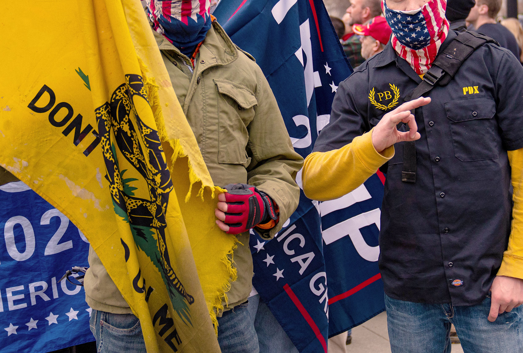Members of the Proud Boys stand for their picture near the U.S. Supreme Court Building during a rally supporting President Donald Trump on January 5, 2021 in Washington, DC. Today's rally kicks off two days of pro-Trump events fueled by President Trump's continued claims of election fraud and a last-ditch effort to overturn the results before Congress finalizes them on January 6. (Robert Nickelsberg/Getty Images)