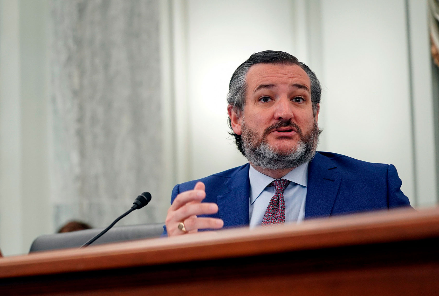 US Senator Ted Cruz (R-TX) questions Pete Buttigieg, nominee for US Transportation Secretary, during his confirmation hearing before the Senate Commerce, Science, and Transportation Committee in Washington, DC, on January 21, 2021. (STEFANI REYNOLDS/POOL/AFP via Getty Images)