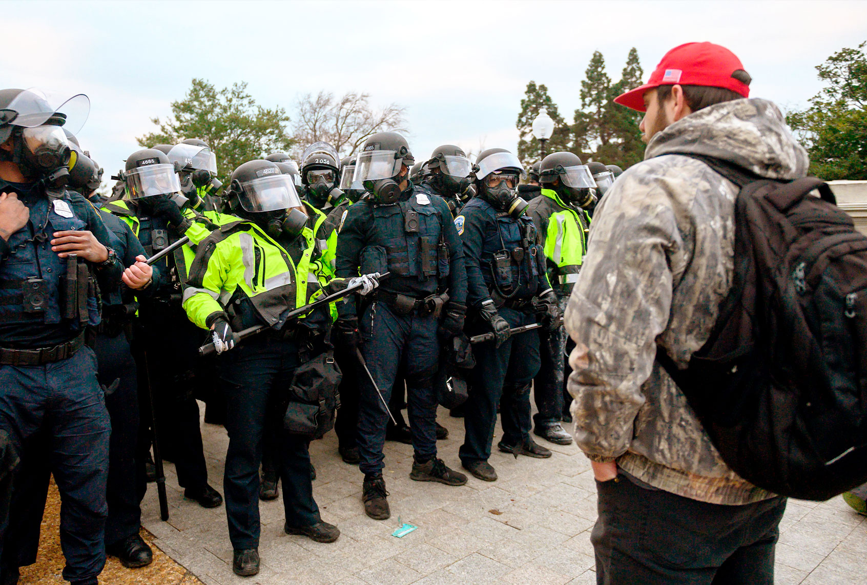 Trump supporters face off with police and security forces in front of the US Capitol in Washington DC on January 6, 2021. - Donald Trump's supporters stormed a session of Congress held today, January 6, to certify Joe Biden's election win, triggering unprecedented chaos and violence at the heart of American democracy and accusations the president was attempting a coup. (ANDREW CABALLERO-REYNOLDS/AFP via Getty Images)