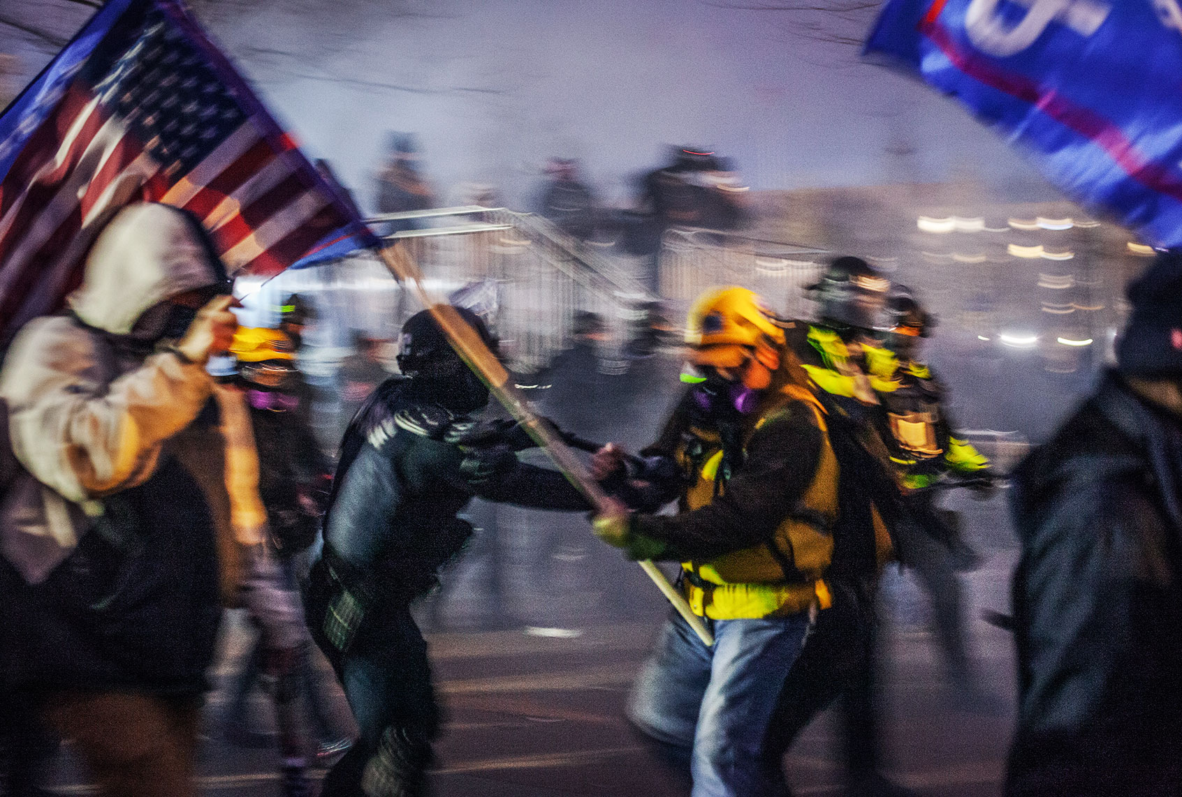 Capitol Police and MPD used physical force and tear gas to force the Trump supporters further away from the U.S Capitol, on January 06, 2021 in Washington, DC. The protesters stormed the historic building, breaking windows and clashing with police. Trump supporters had gathered in the nation's capital today to protest the ratification of President-elect Joe Biden's Electoral College victory over President Trump in the 2020 election. (Shay Horse/NurPhoto via Getty Images)