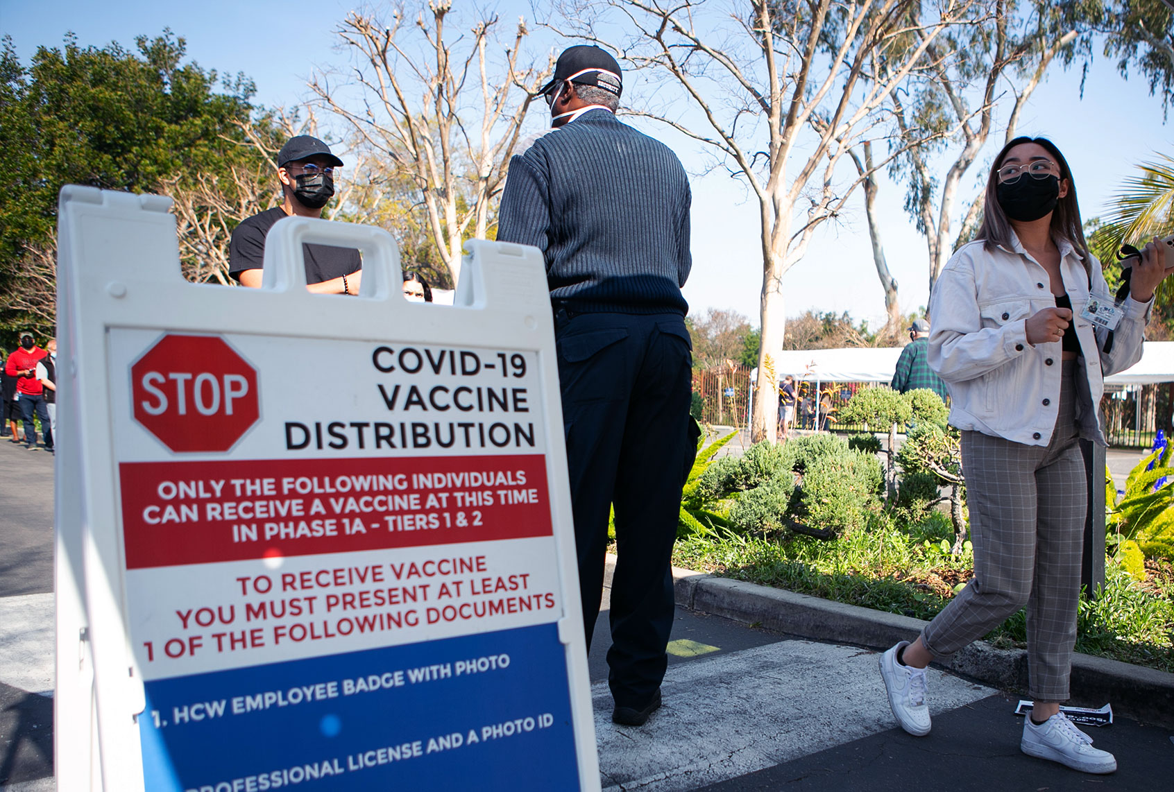 Hundreds of people line up for their turn at receiving the COVID-19 vaccine at Kedren Health on Thursday, Feb. 11, 2021 in Los Angeles, CA. (Jason Armond / Los Angeles Times via Getty Images)