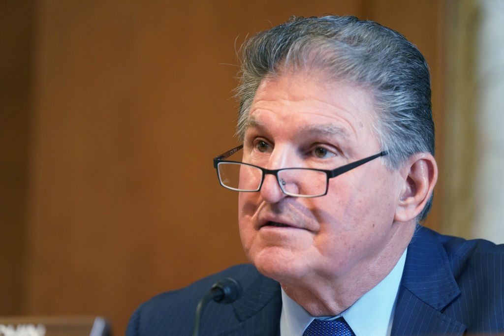 Sen. Joe Manchin, D-W.Va., chairman of the Senate Committee on Energy and Natural Resources, asks questions of Rep. Deb Haaland, D-N.M., President Joe Biden's nominee for secretary of the Interior, during her confirmation hearing. (Leigh Vogel-Pool/Getty Images)