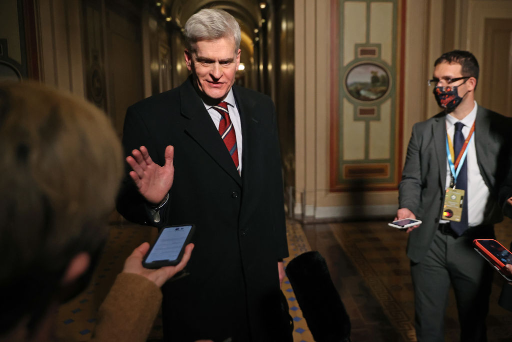 Sen. Bill Cassidy, R-La., talks with reporters as he leaves the Capitol after the first day of former President Donald Trump's second impeachment trial on Feb. 9 in Washington. (Photo by Chip Somodevilla/Getty Images)