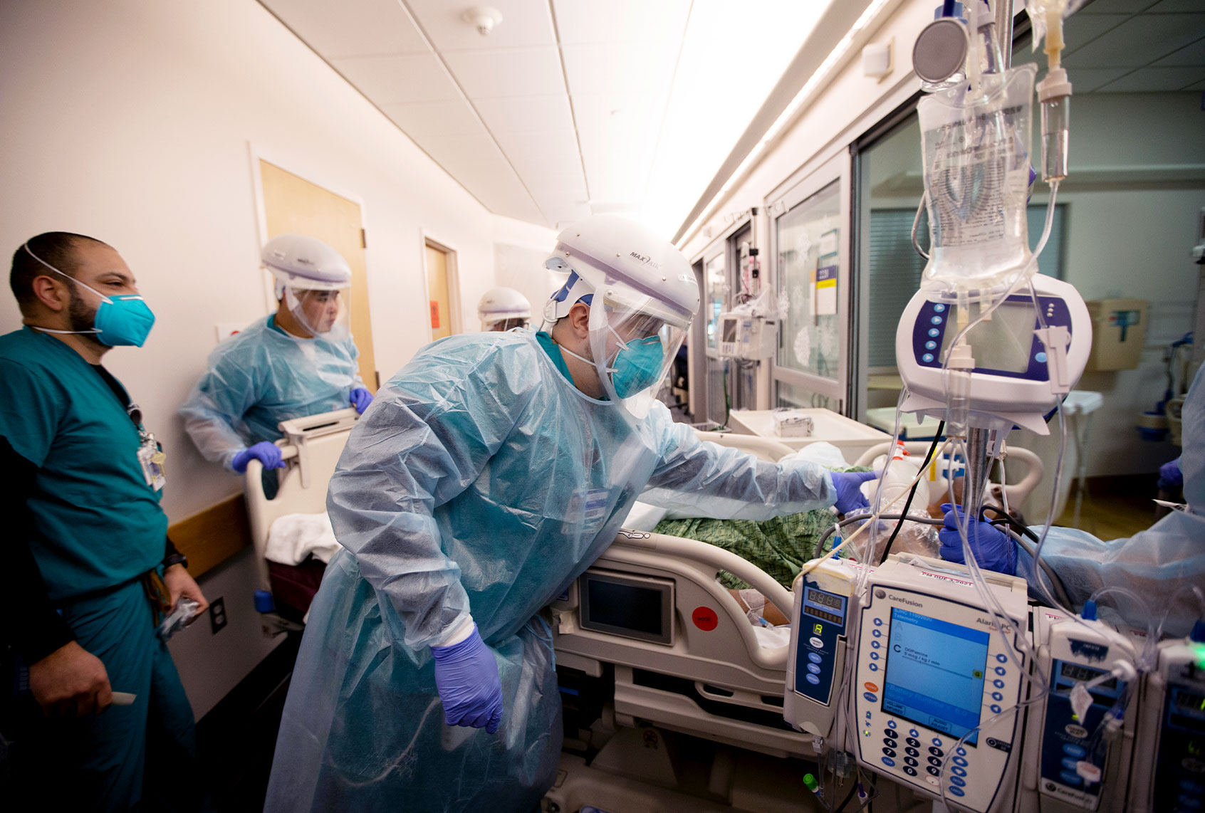A patient surved a code blue and then was rushed to ICU to be intubated and be placed on a ventalator inside Providence Saint John's Health Center on Tuesday, Dec. 15, 2020 in Santa Monica, CA. They have expanded their ICU capacity. They are not currently over capacity at the moment. They have had 19 covid positive cases and they have 23 beds at this moment. The numbers are constantly is shiflting. (Francine Orr / Los Angeles Times via Getty Images)