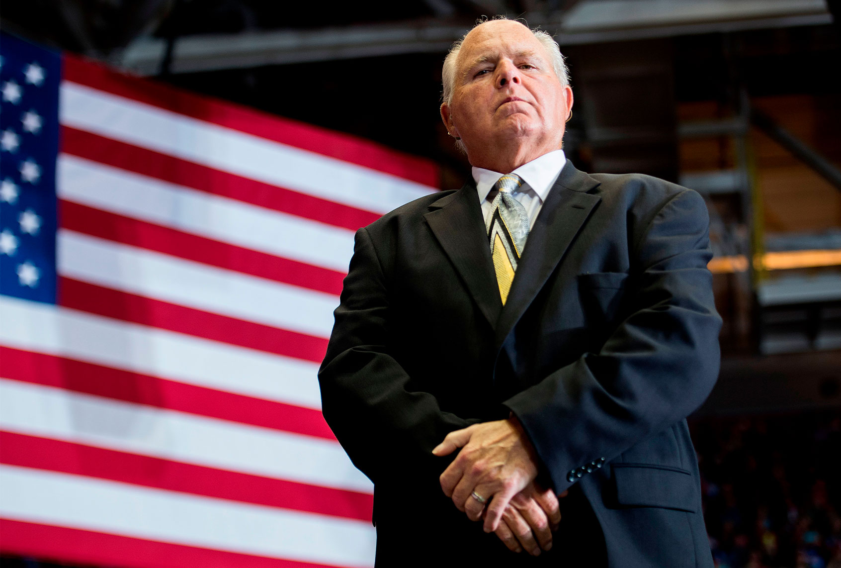 US radio talk show host and conservative political commentator Rush Limbaugh looks on before introducing US President Donald Trump to deliver remarks at a Make America Great Again rally in Cape Girardeau, MO, on November 5, 2018. (JIM WATSON/AFP via Getty Images)