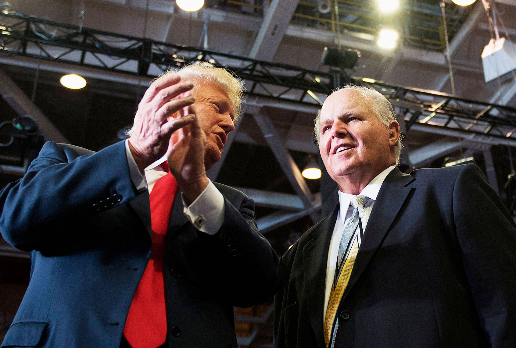 US President Donald Trump alongside radio talk show host Rush Limbaugh arrive at a Make America Great Again rally in Cape Girardeau, Missouri on November 5, 2018. (JIM WATSON/AFP via Getty Images)