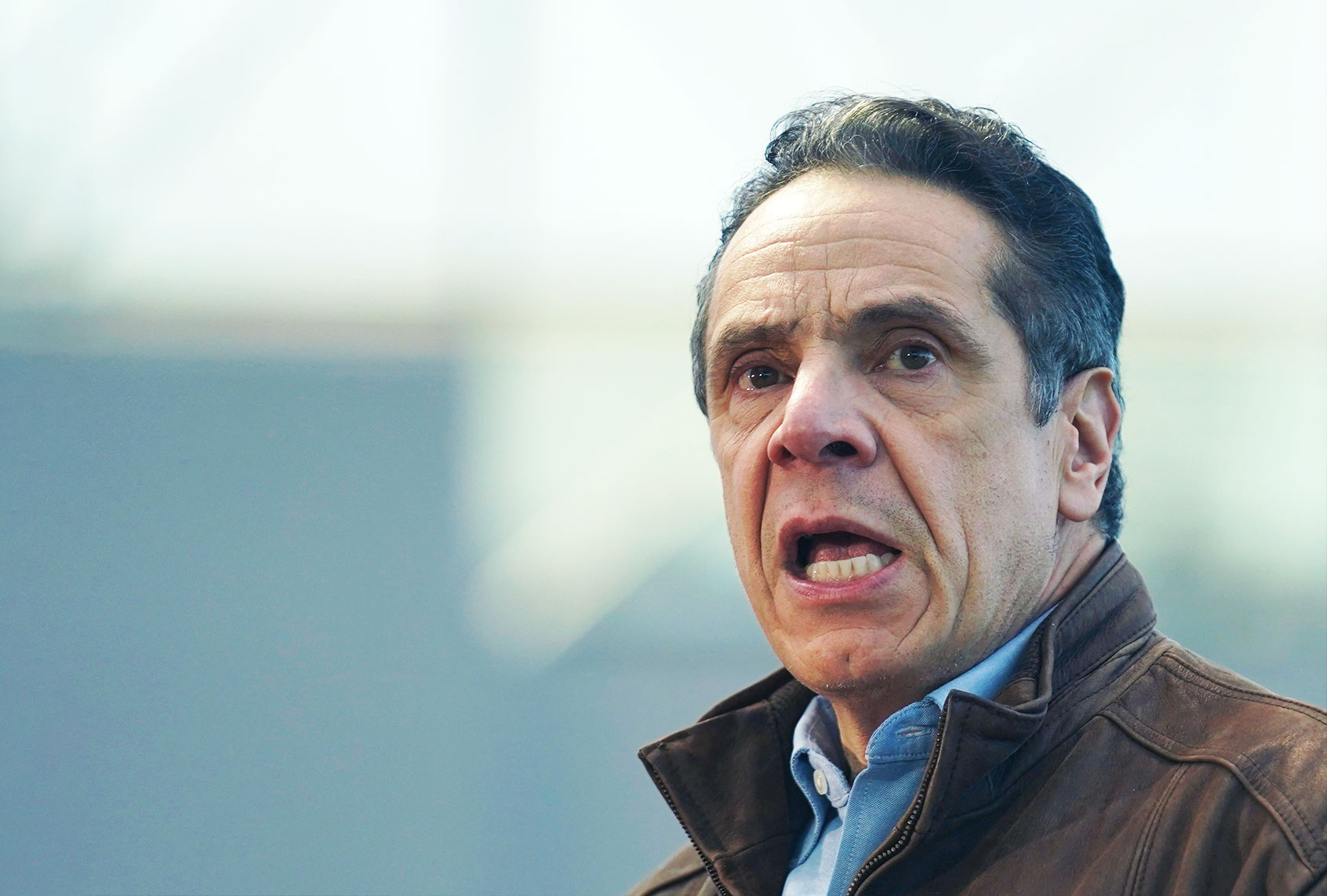 New York Governor Andrew Cuomo speaks to people at a vaccination site on March 8, 2021, in New York. (SETH WENIG/POOL/AFP via Getty Images)