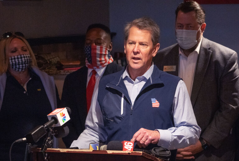 Georgia Gov. Brian Kemp speaks at a news conference about the state's new Election Integrity Law that passed this week at AJ’s Famous Seafood and Poboys on April 10, 2021 in Marietta, Georgia. Major League Baseball announced it would move the All-Star Game out of Georgia in response to the election bill, which opponents claim will negatively affect the minority population's ability to vote. There is also a concern for the economic impact this will have on the state following the MLB's decision. The bill's passage follows the Governor's decision to lift many of the restrictions in place for protection from COVID-19. (Megan Varner/Getty Images)