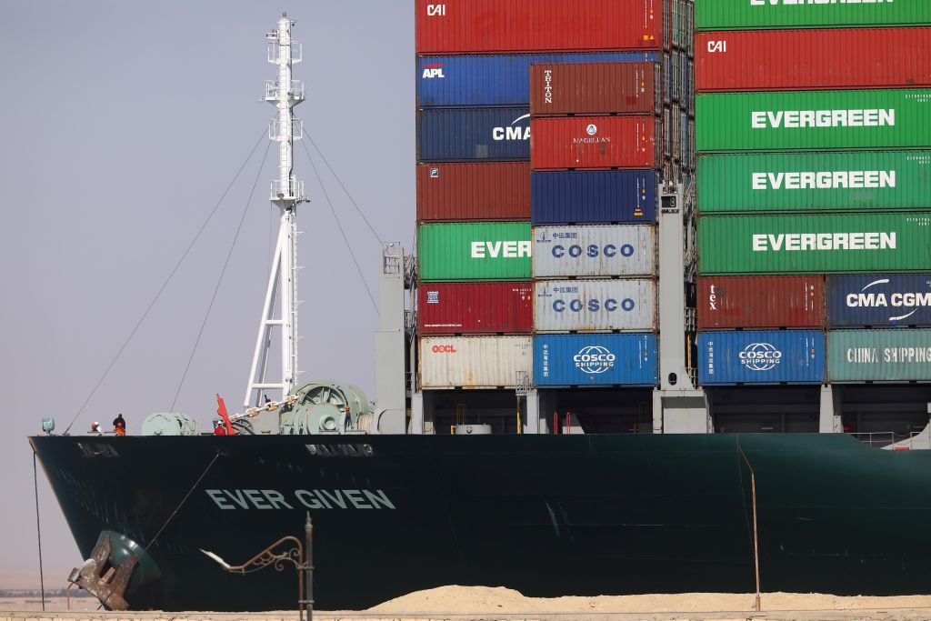 SUEZ CANAL, March 29, 2021 -- Photo taken on March 29, 2021 shows the container ship Ever Given moving on the Suez Canal, Egypt. The traffic in Suez Canal resumed after massive container ship Ever Given has been successfully refloated as being stranded in the canal for almost a week, Egypt's Suez Canal Authority SCA said on Monday. (Xinhua/Ahmed Gomaa via Getty Images)