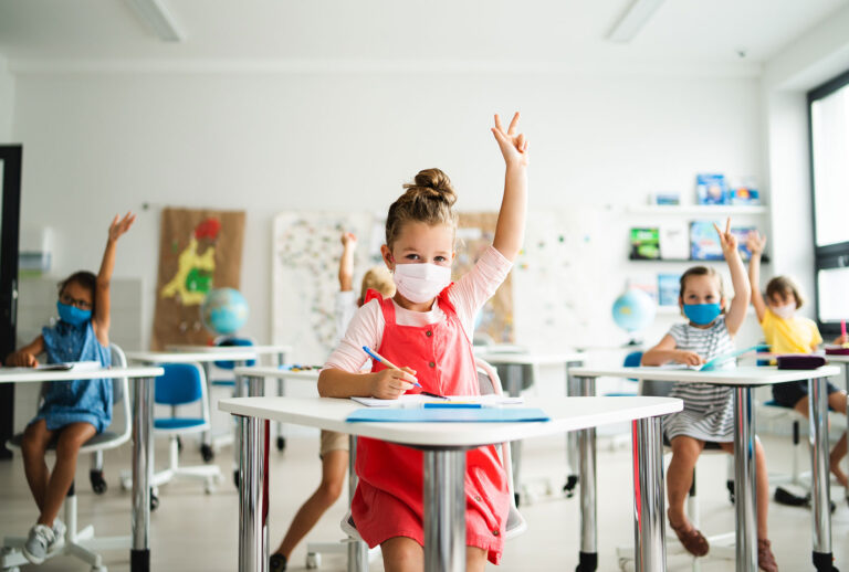 Small children with face mask back to school (Getty Images)