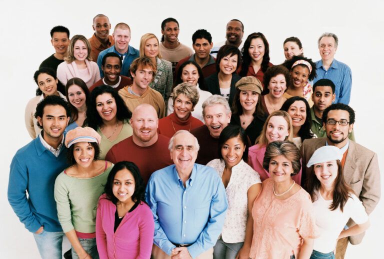 A diverse group of smiling people (Getty Images)