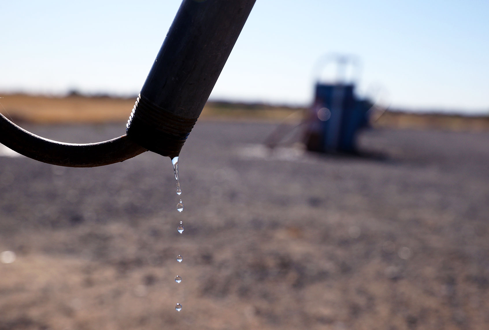 Recycled water drips out of a nozzle at the Ironhouse Sanitation District residential recycled water fill station on May 20, 2021 in San Francisco, California. (Justin Sullivan/Getty Images)