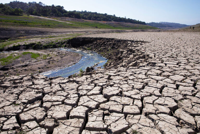 Dry and cracked riverbed is seen during drought season on April 23, 2021 in Santa Clara County, California. (Liu Guanguan/China News Service via Getty Images)