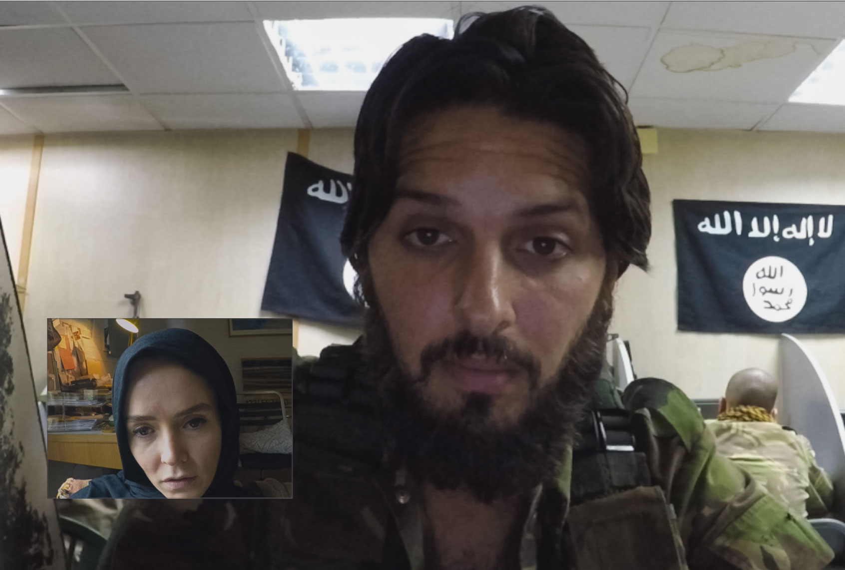 Valene Kane and Shazad Latif in "Profile" (BEZELEVS/Focus Features)