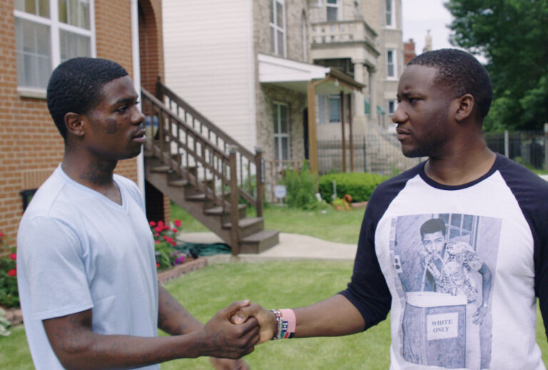 Shamont Slaughter and MAAFA Redemption Project founder Marshall Hatch Jr. on the West Side of Chicago in "All These Sons" (Concordia Studio)