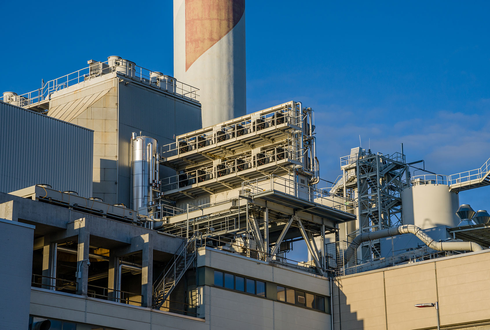 Image of carbon capture technology which uses fans and filters to remove the green house gas carbon dioxide from the atmosphere. The big fans suck in air from the atmosphere and take out the green house gas carbon dioxide. This technology can solve the problem of climate change and help with the climate crisis. (iStock/Getty Images/IGphotography)