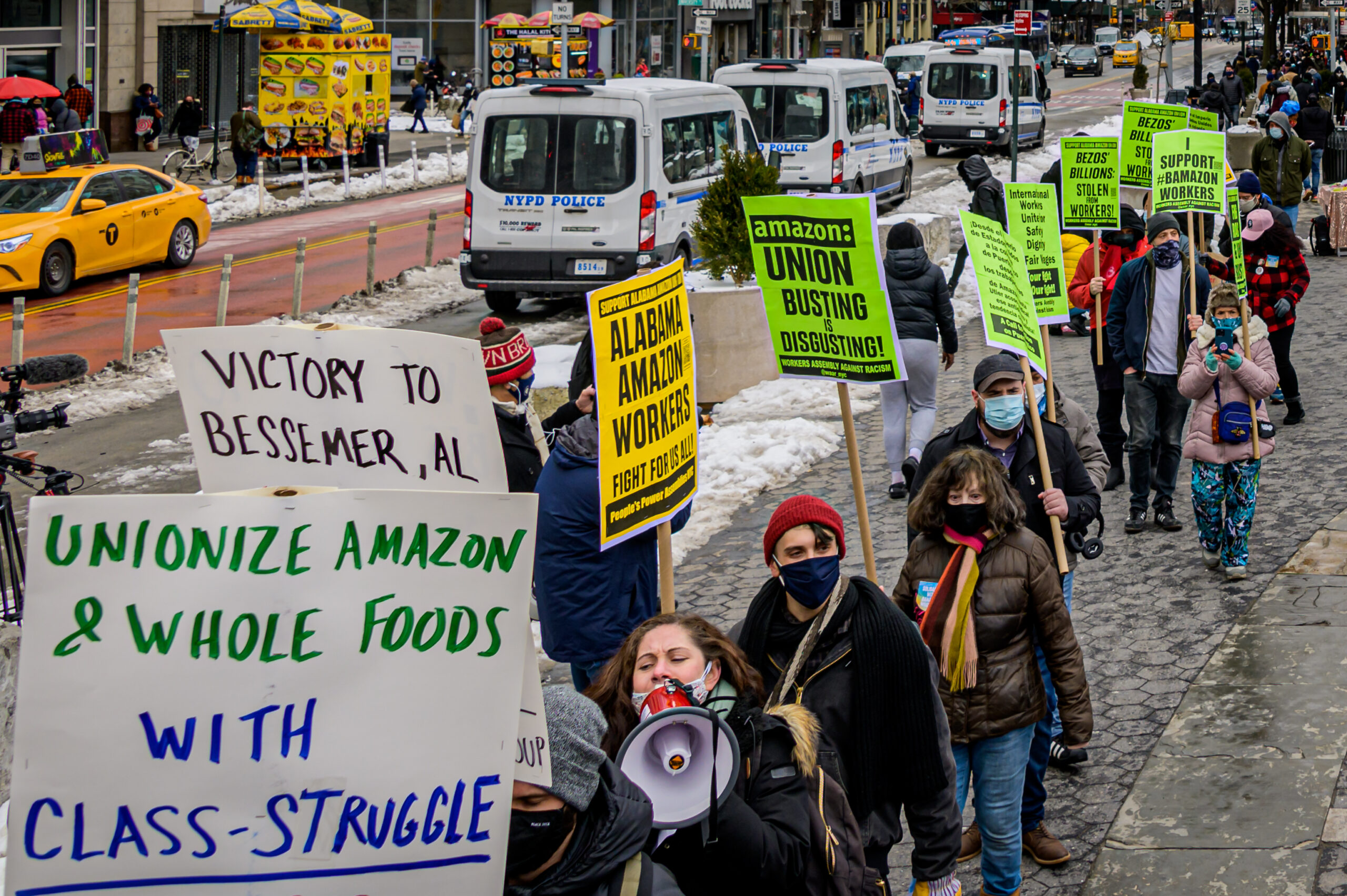 Protesters outside a Jeff Bezos-owned Whole Foods store in New York City, an event in solidarity with unionizing Amazon workers in Bessemer, Alabama. (Getty Images)