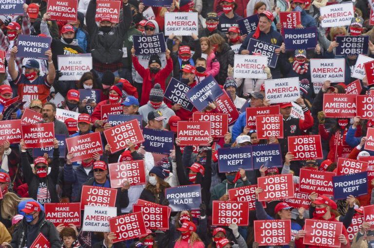 Supporters of then-President Donald Trump hold signs at a rally in Pennsylvania. (Getty Images)