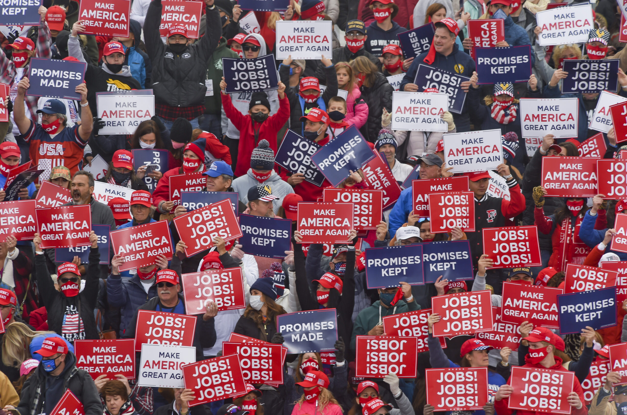 Supporters of then-President Donald Trump hold signs at a rally in Pennsylvania. (Getty Images)