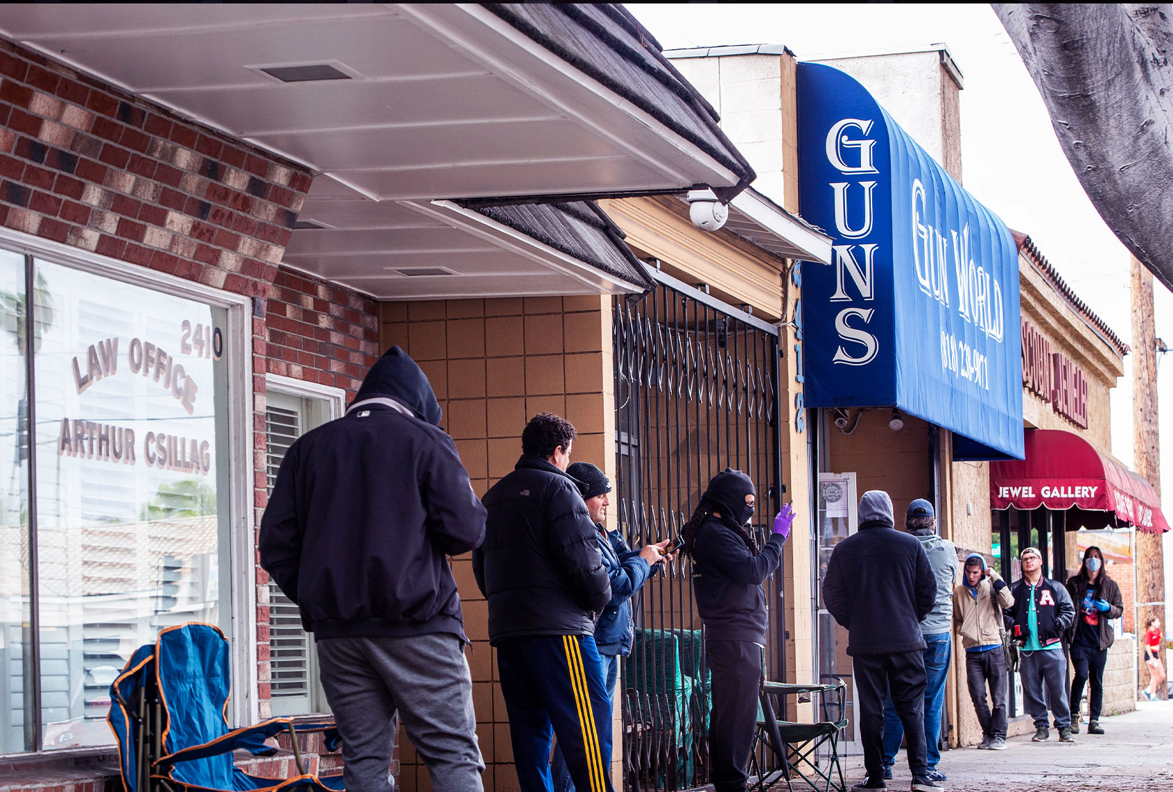 Shoppers wait in line to purchase ammunition and guns at Gun World in Burbank on Tuesday, March 17, 2020 as US sales of guns and ammunition soar amid the coronavirus outbreak. (Sarah Reingewirtz/MediaNews Group/Pasadena Star-News via Getty Images)