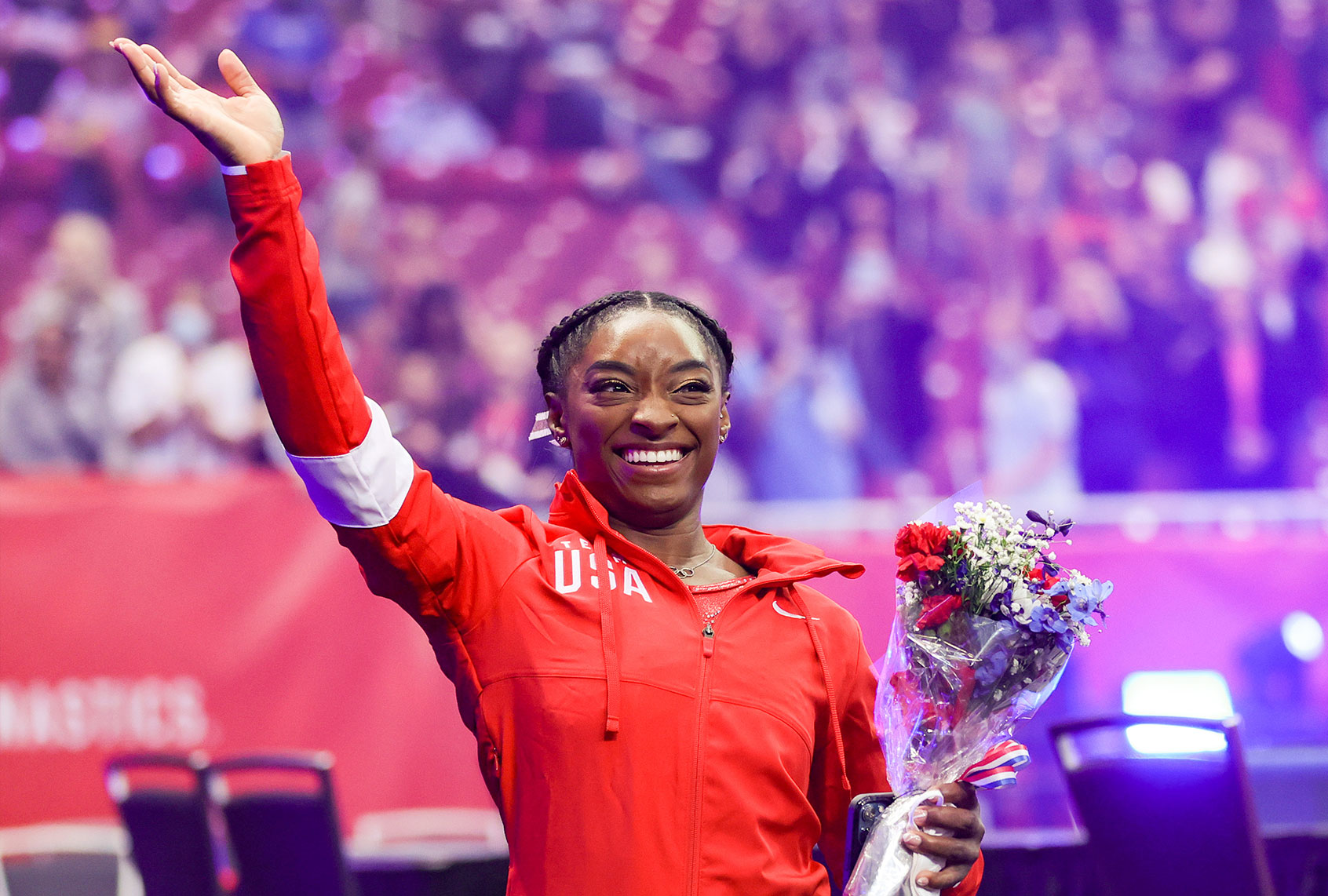 Simone Biles waves to the crowd as she exits following the Women's competition of the 2021 U.S. Gymnastics Olympic Trials at America’s Center on June 27, 2021 in St Louis, Missouri. (Carmen Mandato/Getty Images)