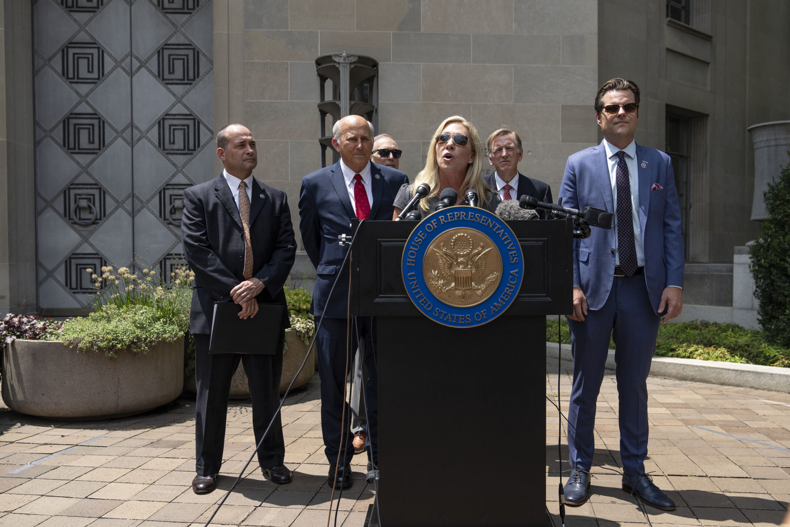 From left to right: Reps. Bob Good, Louie Gohmert, Andy Biggs, Marjorie Taylor Greene, Paul Gosar and Matt Gaetz hold a news conference outside the U.S. Department of Justice to demand answers from Attorney General Merrick Garland on the status of Jan. 6 prisoners. (Getty Images)