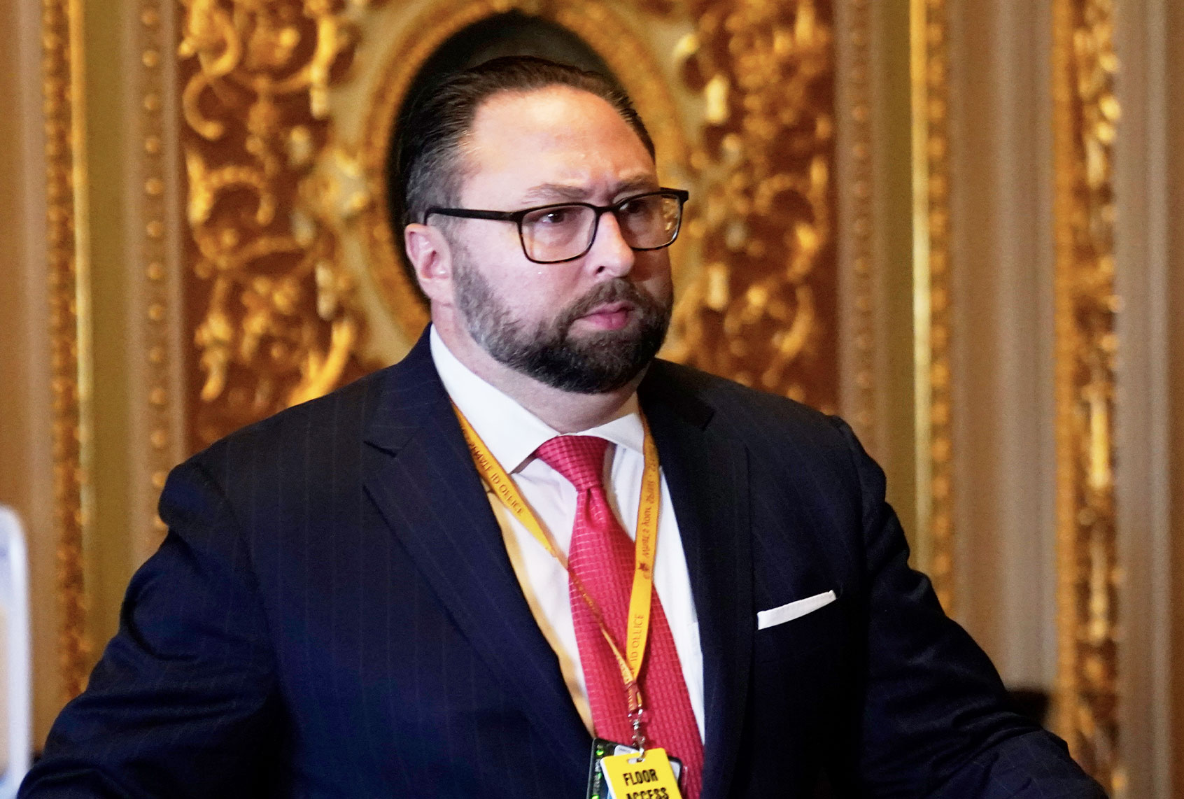 Jason Miller, Senior Adviser to the Trump 2020 re-election campaign, walks in on the first day of former President Donald Trump's second impeachment trial at the U.S. Capitol on February 9, 2021 in Washington, DC. House impeachment managers will make the case that Trump was “singularly responsible” for the January 6th attack at the U.S. Capitol and he should be convicted and barred from ever holding public office again. (Andrew Harnik - Pool/Getty Images))