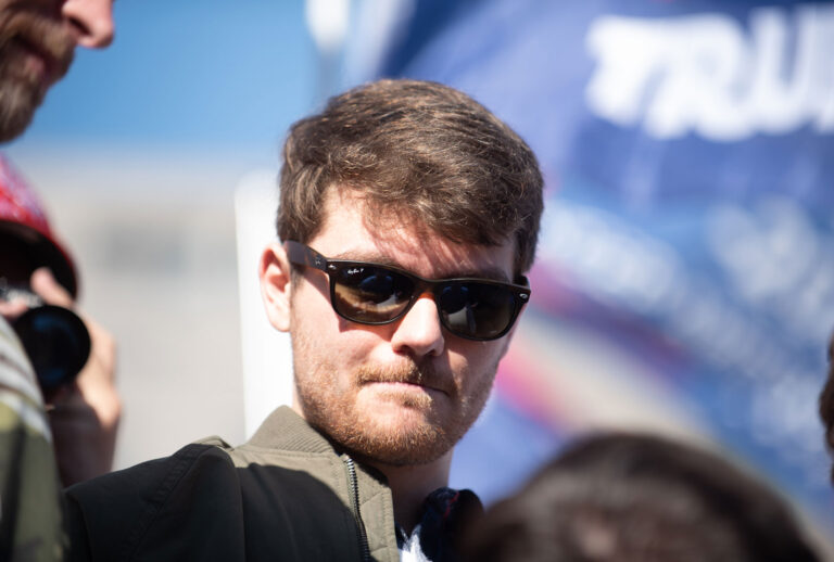 Nick Fuentes, the leader of a Christian based extremist white nationalist group speaks to his followers, 'the Groypers.' in Washington D.C. on November 14, 2020 (Zach D Roberts/NurPhoto via Getty Images)