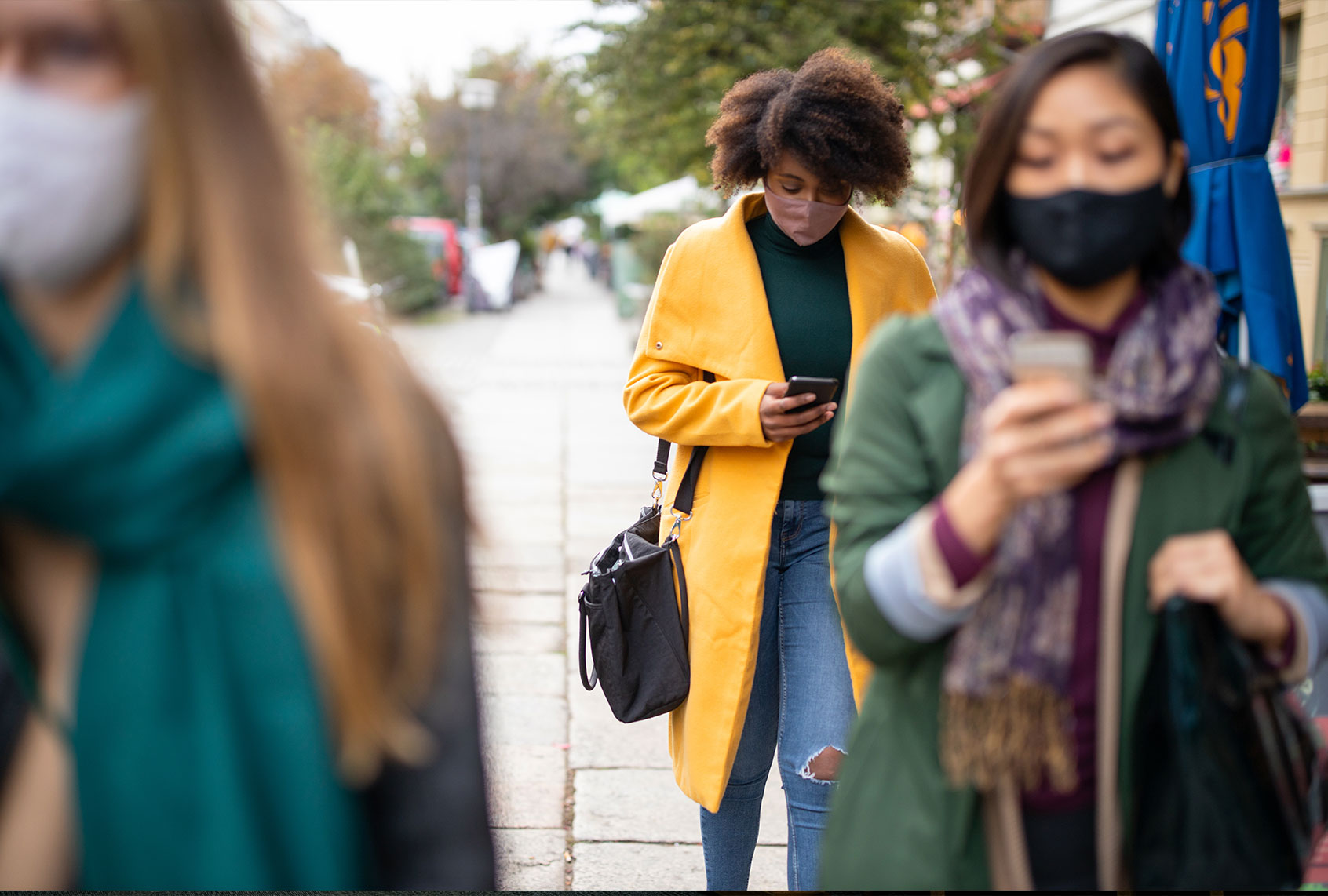 People commuting in the city wearing face masks (Getty Images/Luis Alvarez)
