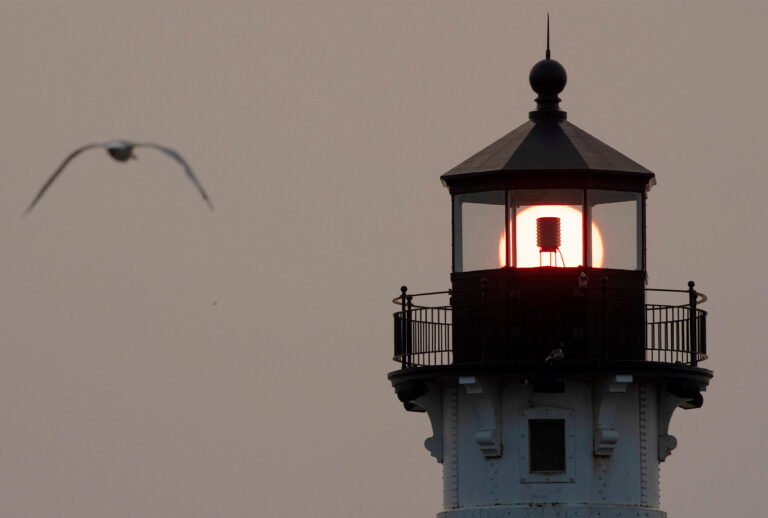 The sun rose over the Duluth Harbor North Breakwater Light on Monday, July 12, 2021. Canadian wildfires have caused smoke to drift in the atmosphere and blanket the Midwest skies with haze this past weekend. This has caused magnificent red sunrises over the last few mornings. Canadian wildfires have caused smoke to drift in the atmosphere and blanket the Midwest skies with haze this past weekend. This has caused magnificent red sunrises over the last few mornings including over Lake Superior and Canal Park in Duluth on Monday, July 12, 2021. (Alex Kormann, Star Tribune via Getty Images)
