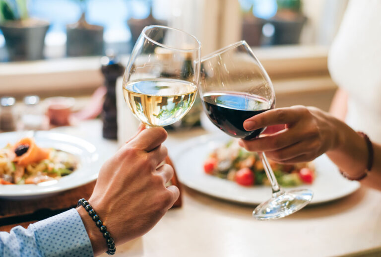 Couple toasting with wine (Getty Images/Westend61)