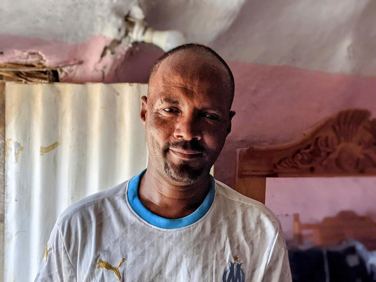 Dr. Mebrahtom Yehdago, 37, in Tenedba refugee camp, Sudan