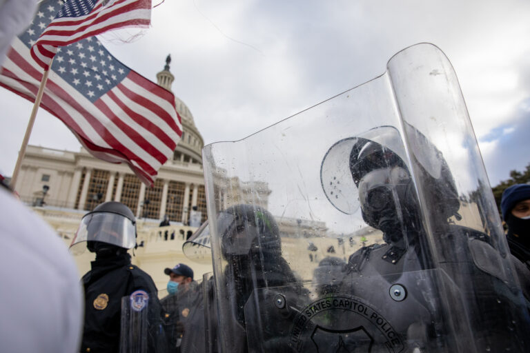 Pro-Trump protestors clash with police during the tally of electoral votes that that would certify Joe Biden as the winner of the U.S. presidential election outside the US Capitol in Washington, DC on Wednesday, January 6, 2021. (Amanda Andrade-Rhoades/For The Washington Post via Getty Images)