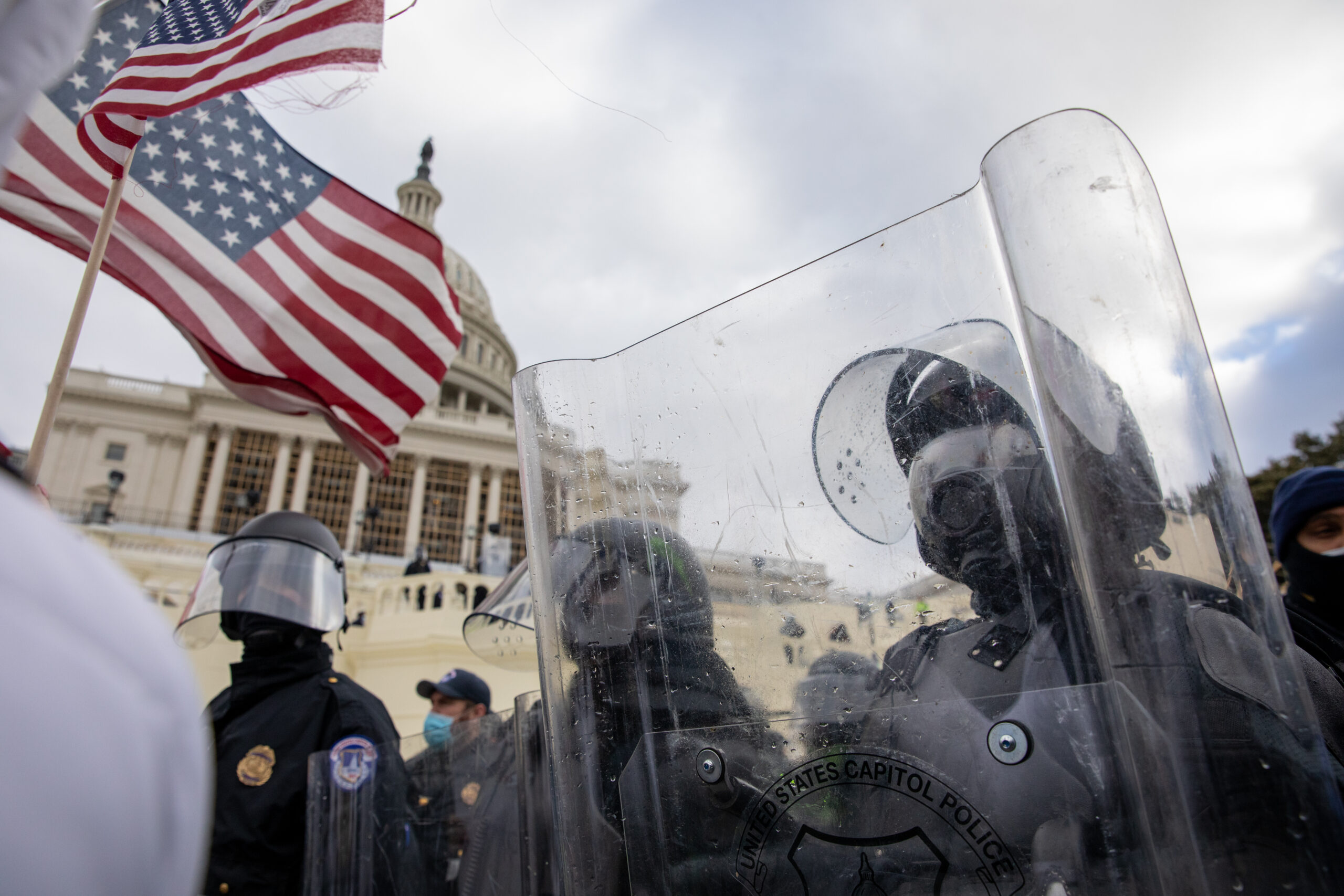 Pro-Trump protestors clash with police during the tally of electoral votes that that would certify Joe Biden as the winner of the U.S. presidential election outside the US Capitol in Washington, DC on Wednesday, January 6, 2021. (Amanda Andrade-Rhoades/For The Washington Post via Getty Images)