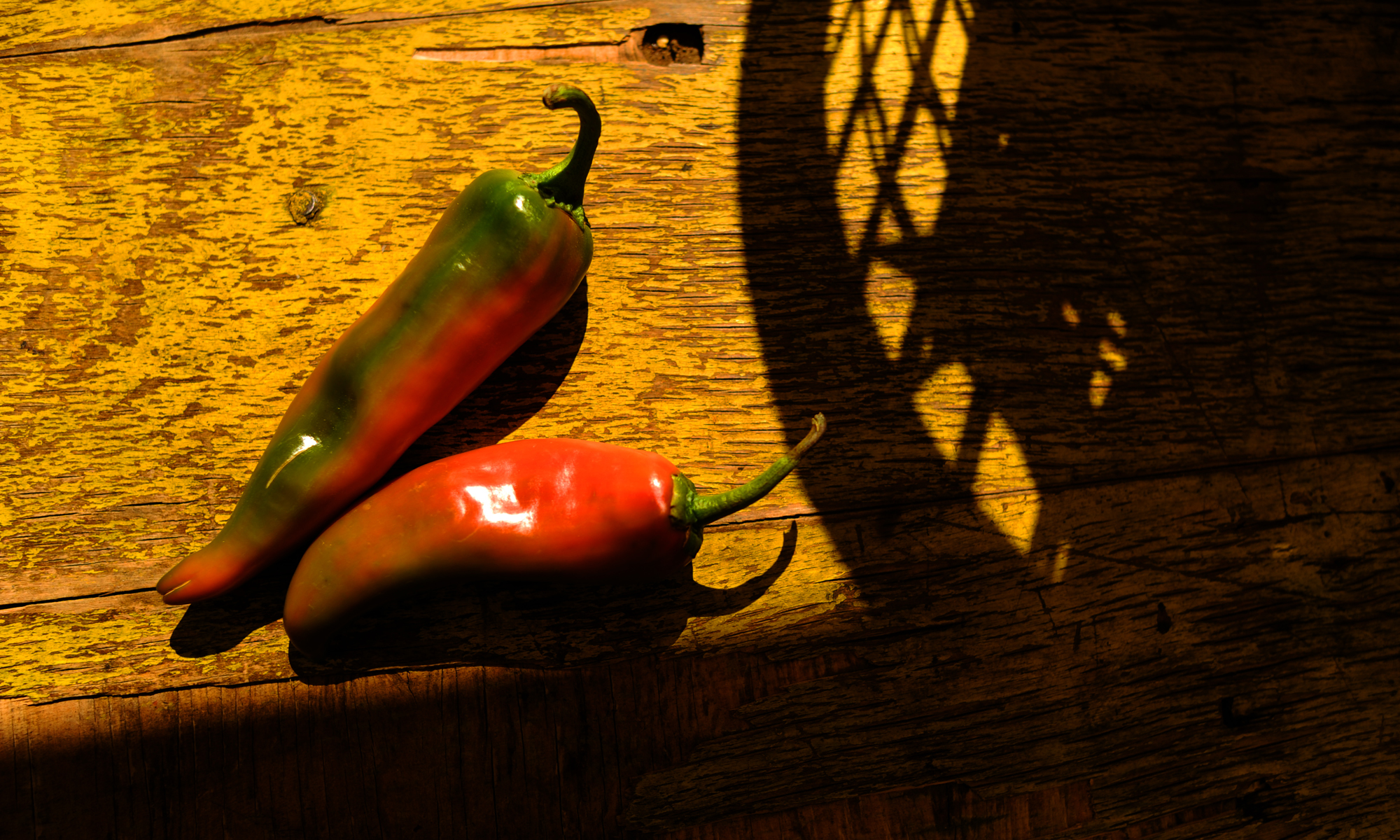 Baskets of hatch green chiles are ready to be roasted at a chile stand. (RJ Sangosti/The Denver Post via Getty Images)